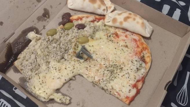 Pidió una pizza y le llegó con una porción menos: las razones que dio el restaurante | Información General