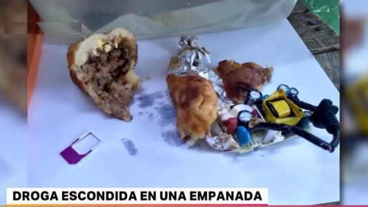 Volvía de una salida transitoria con drogas, un celular y un cargardor escondidos en empanadas de carne