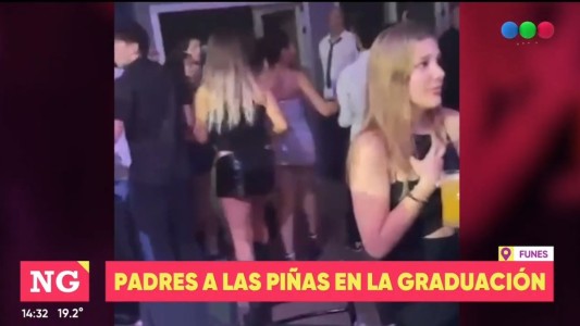 Padres a las piñas en una fiesta de graduación en Funes