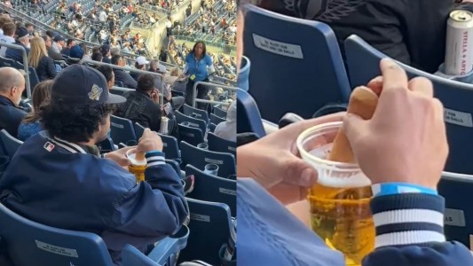 Insólito: captaron a un hombre mojando un pancho en cerveza durante un juego